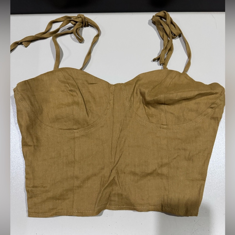 Taupe crop top. With tie straps and zipper in the side